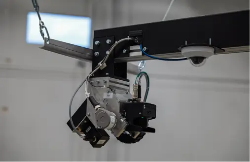 N9 lidar technology tab photo of sensor man scanning a broom head for the purpose of slotting or warehouse pick and pack using dimensioning systems